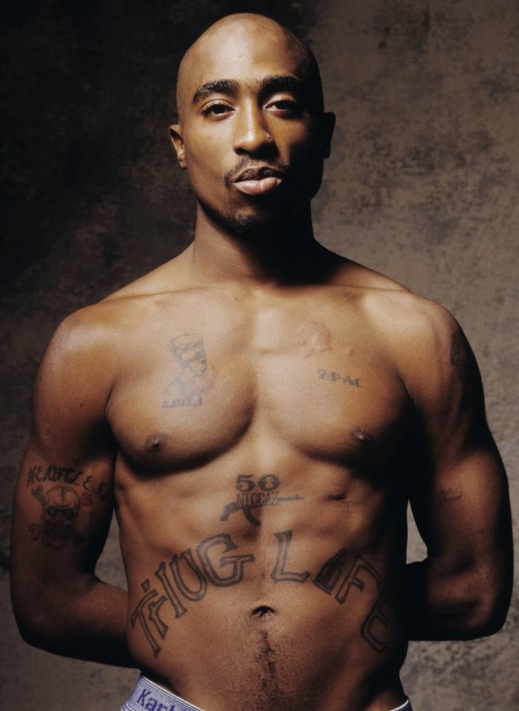 Tupac Shakur's 21 Tattoos & Their Meanings – Body Art Guru | Tupac thug  life tattoo, Tupac tattoo, Tupac