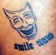 “Smile now” tattoo